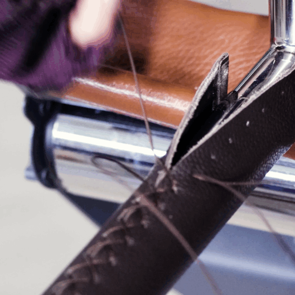 Gainage du cuir sur barre en acier